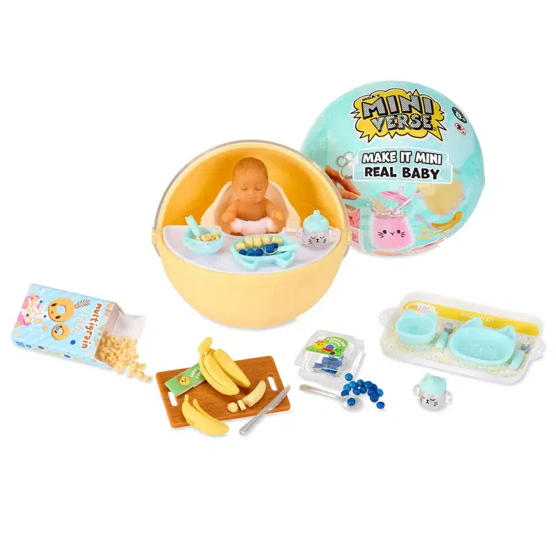 Capsule Miniverse Make It Mini Real Baby avec le bébé et ses accessoires de repas